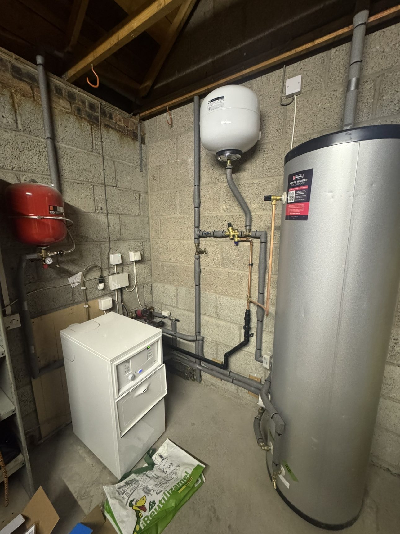 Boiler and hot water cylinder installed in a Musselburgh utility room