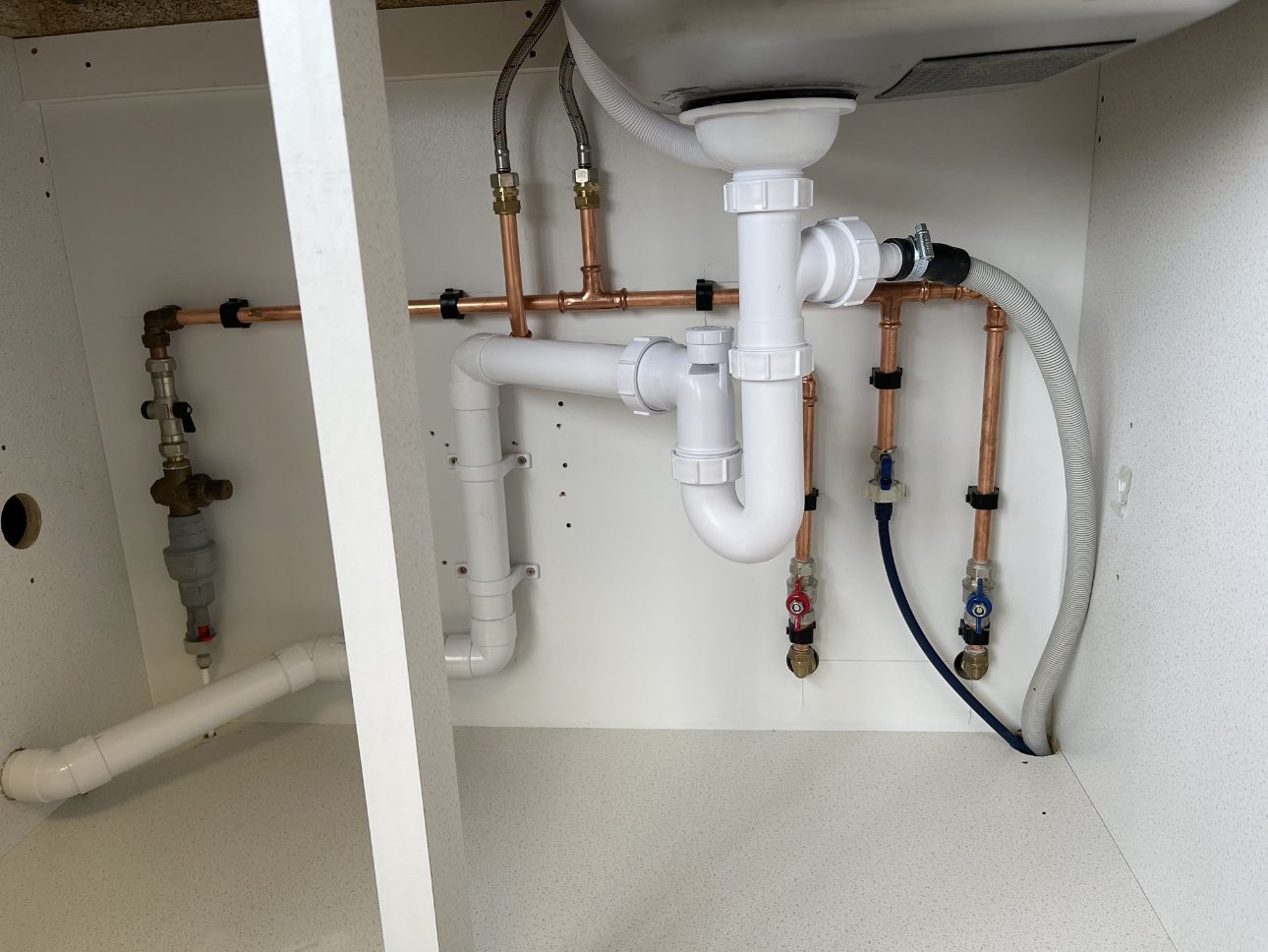New plumbing installation with valves and connections in an Edinburgh home
