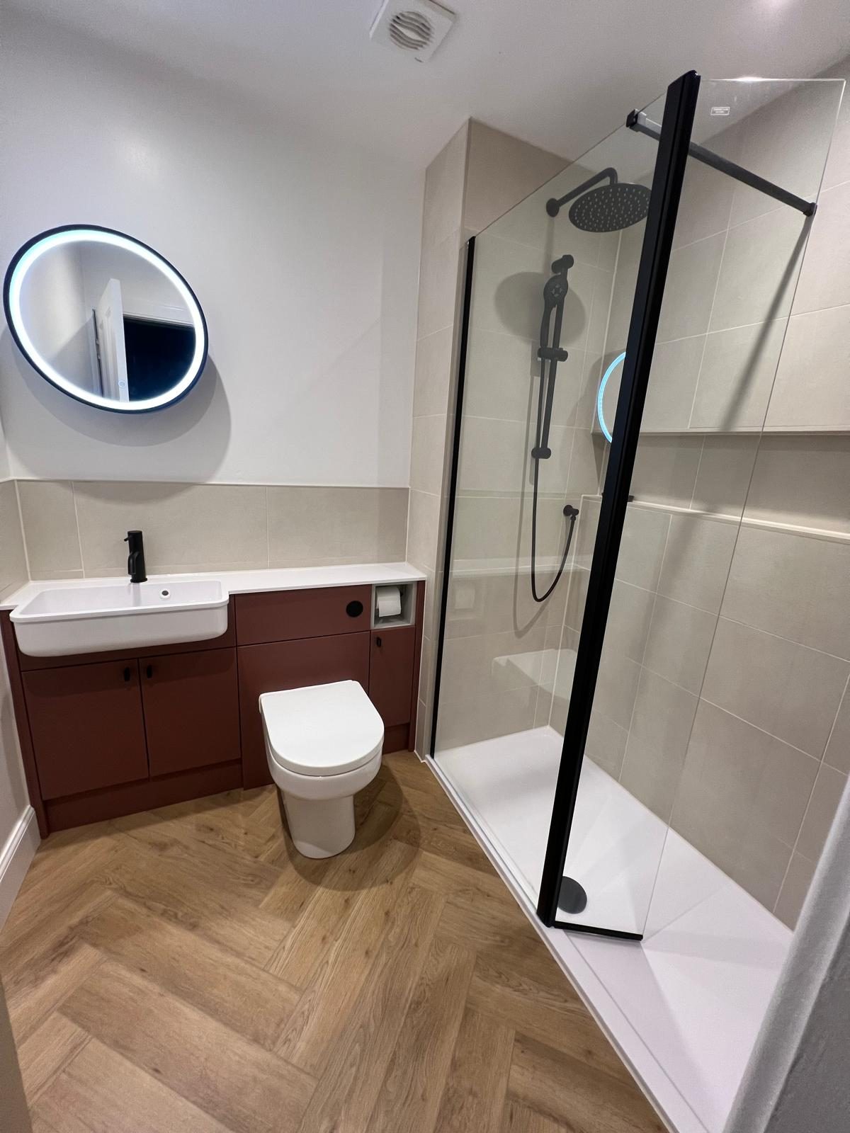 Walk-in shower installation with tiled walls in an Edinburgh bathroom