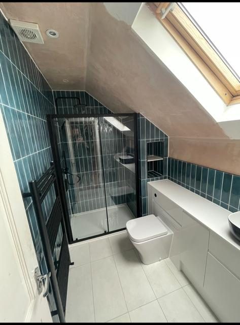 Fitted bathroom with tiled walls completed by Pentaburgh in Edinburgh