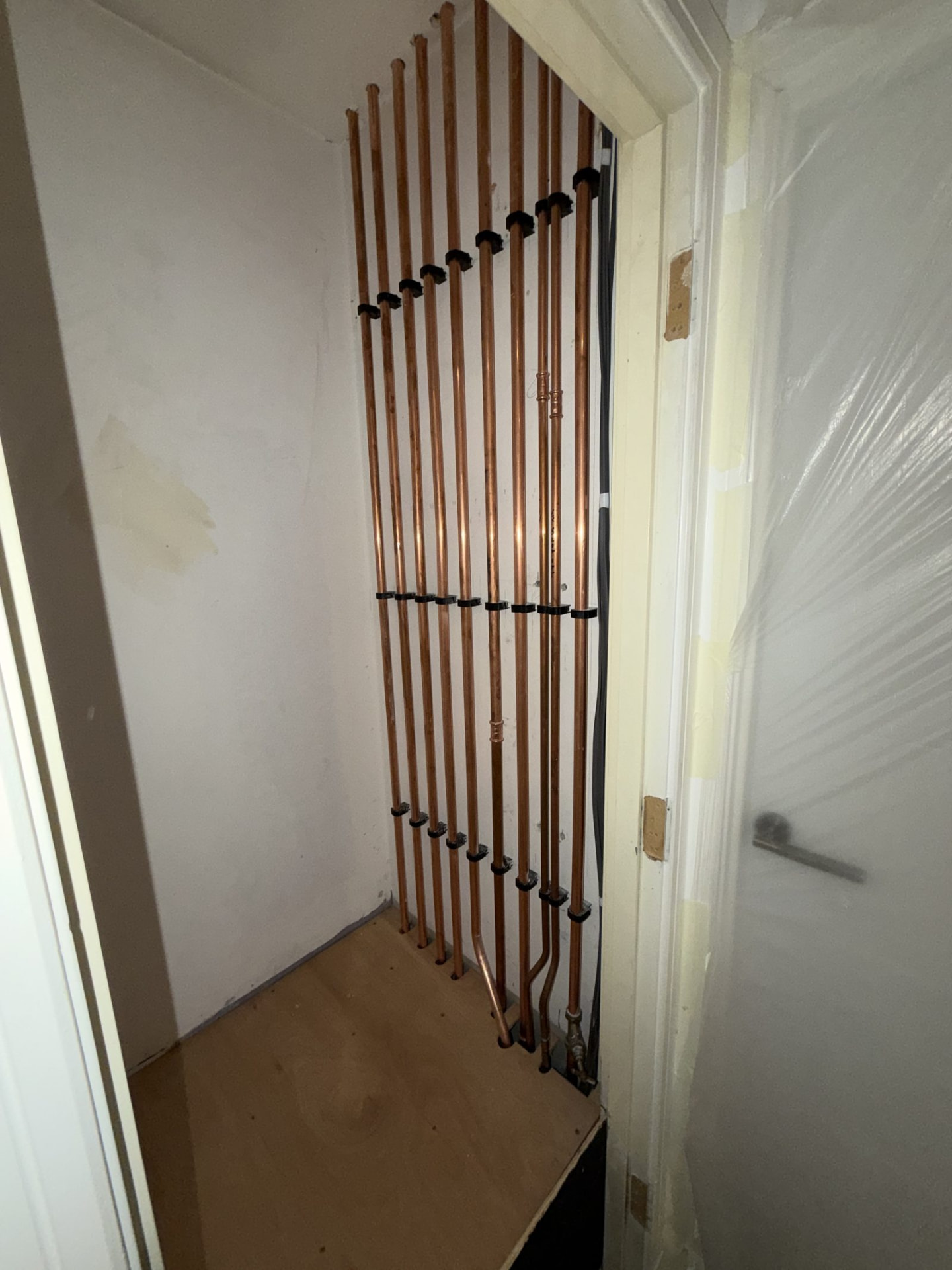 Second fix plumbing pipework prepared for a new bathroom installation in Edinburgh
